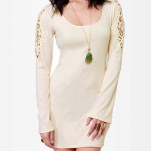 Cream boutique dress with cutout/lace detail. New.